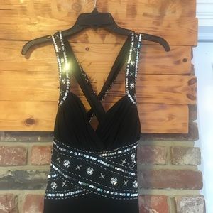 Black, silver sequin gown with criss-cross back, new with tag